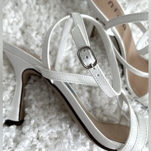 Women UNISA white heels dress sandals with ankle buckle closure